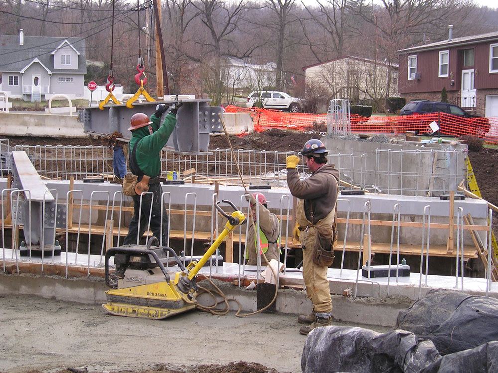 Crew members working on a bridge deck