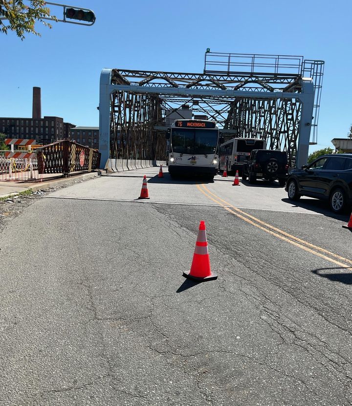 Priority Repairs: Clay St, Bridge St, Jackson St: steel truss bridge roadway with traffic control